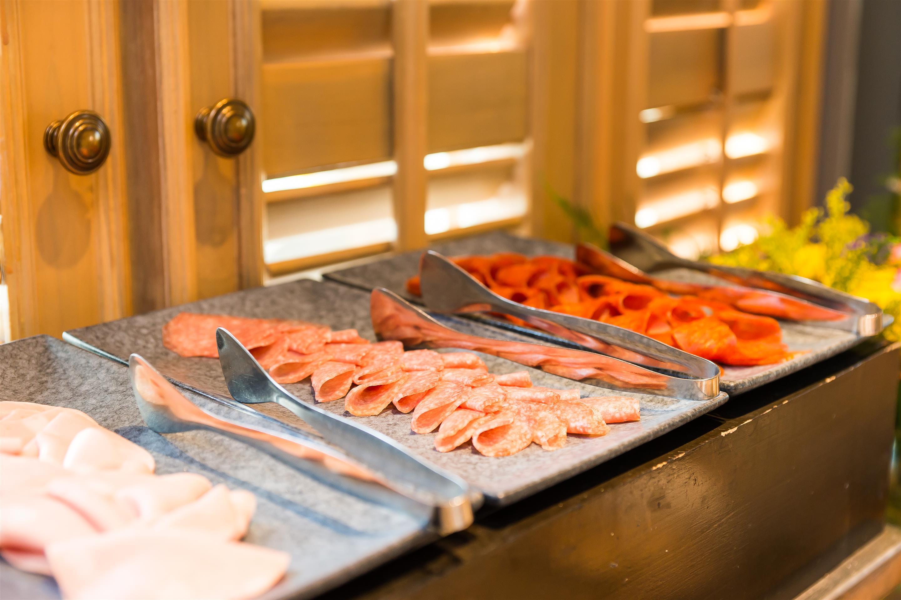 Akara Hotel Бангкок Экстерьер фото A buffet of cold cuts