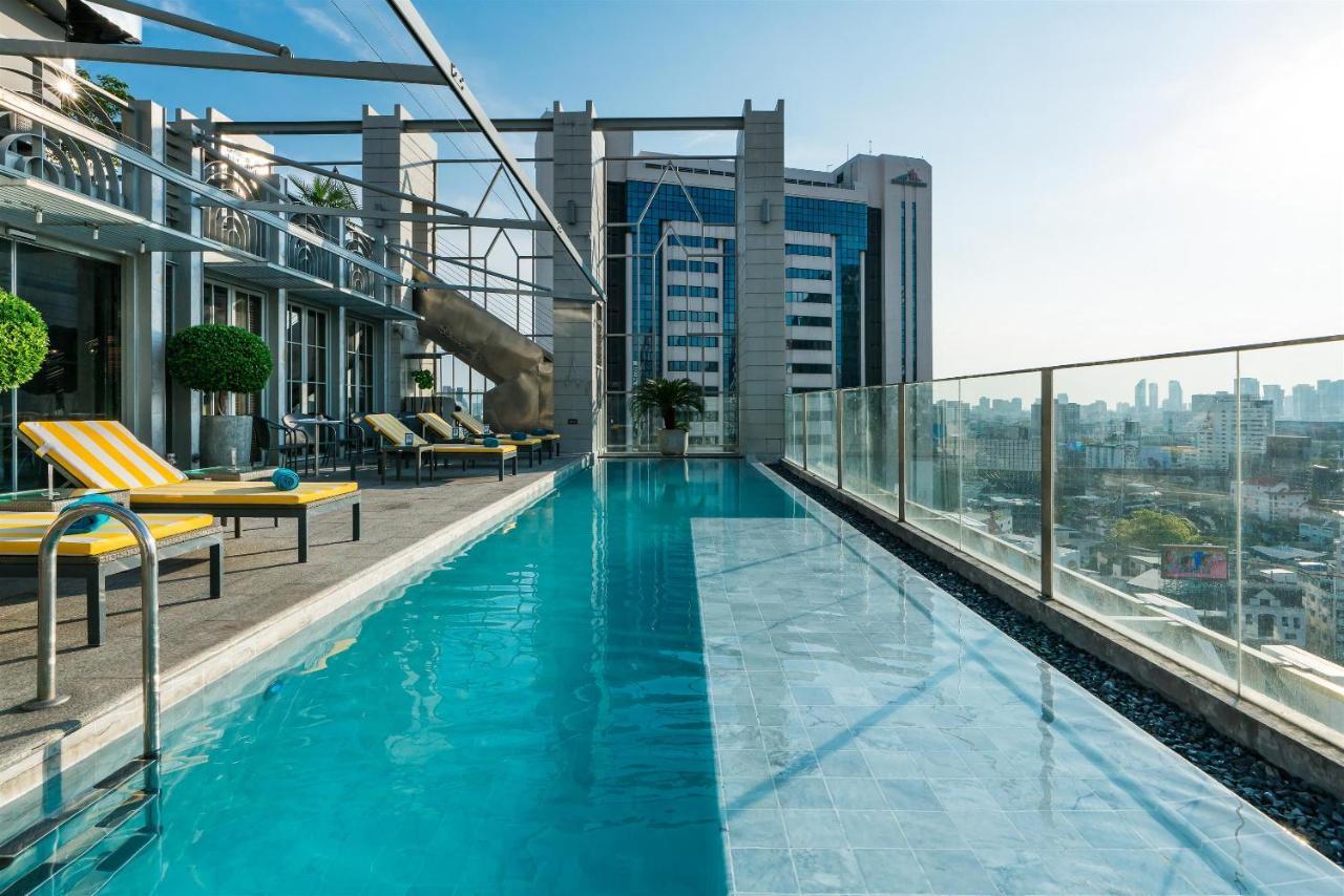 Akara Hotel Бангкок Экстерьер фото Rooftop pool at the hotel